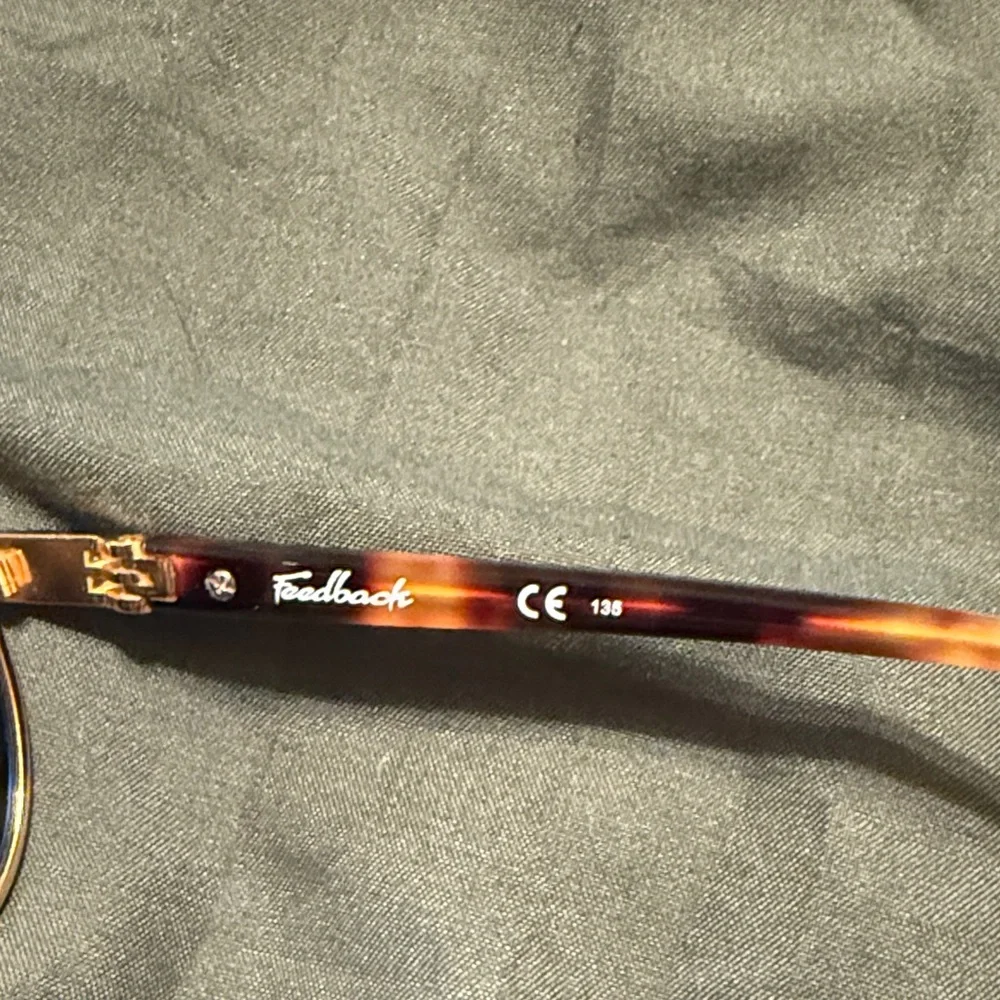 Oakley Tortoiseshell Frame Sunglasses with Blue Lenses with case